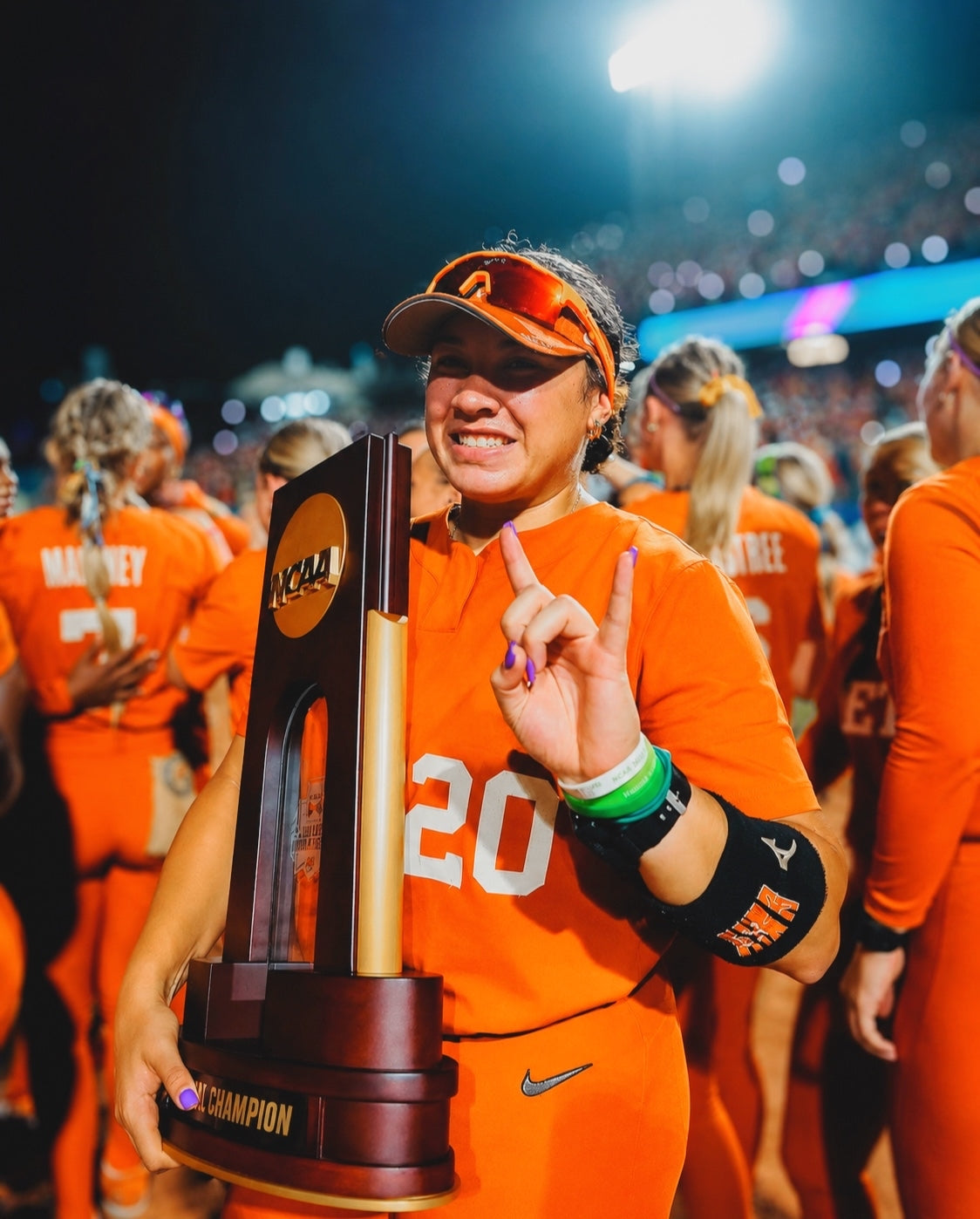 Katie Stewart of Texas softball wearing Solaro Shades softball sunglasses, the top choice for baseball sunglasses.