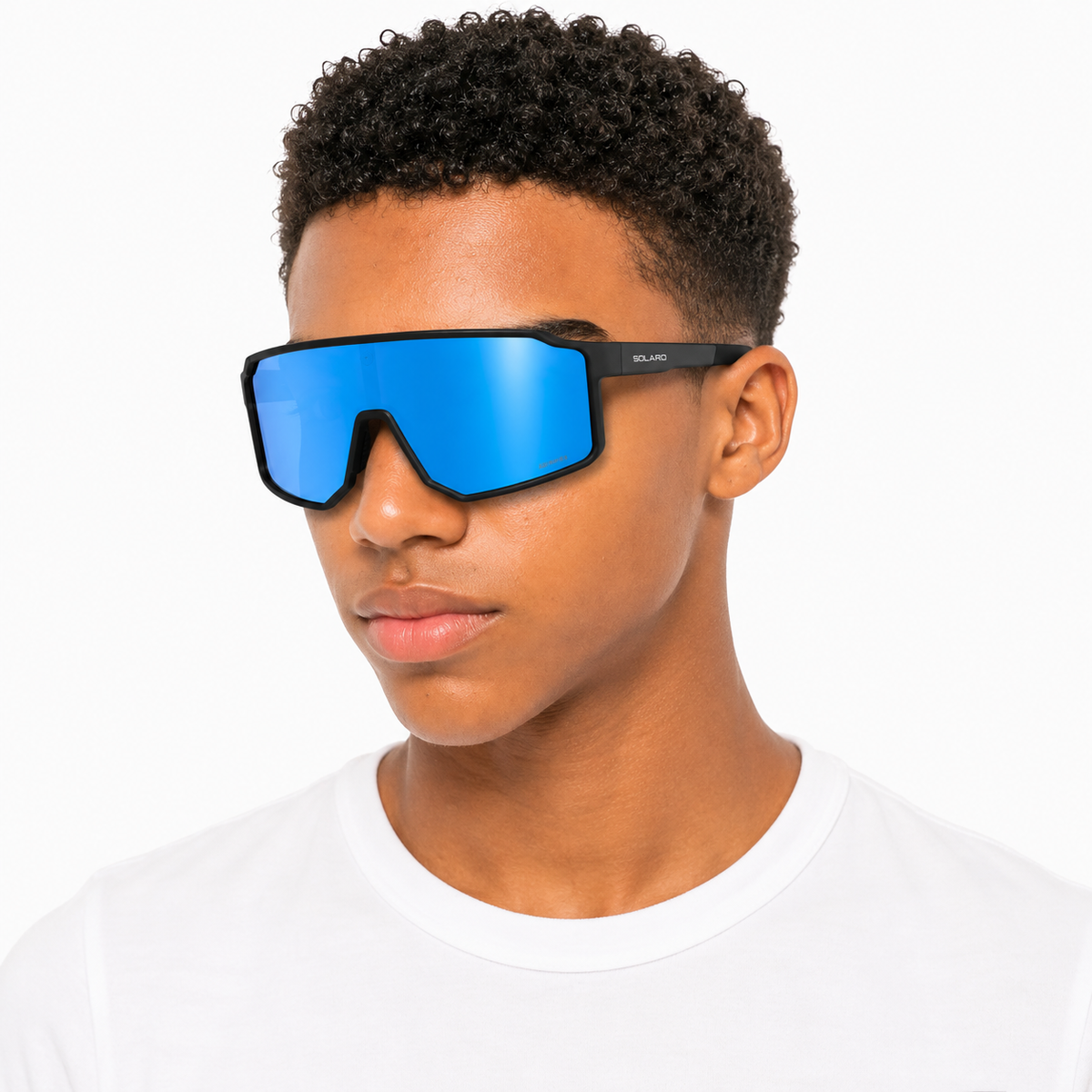 Person wearing solaro pluto reflective blue sunglasses with black frame on a white background