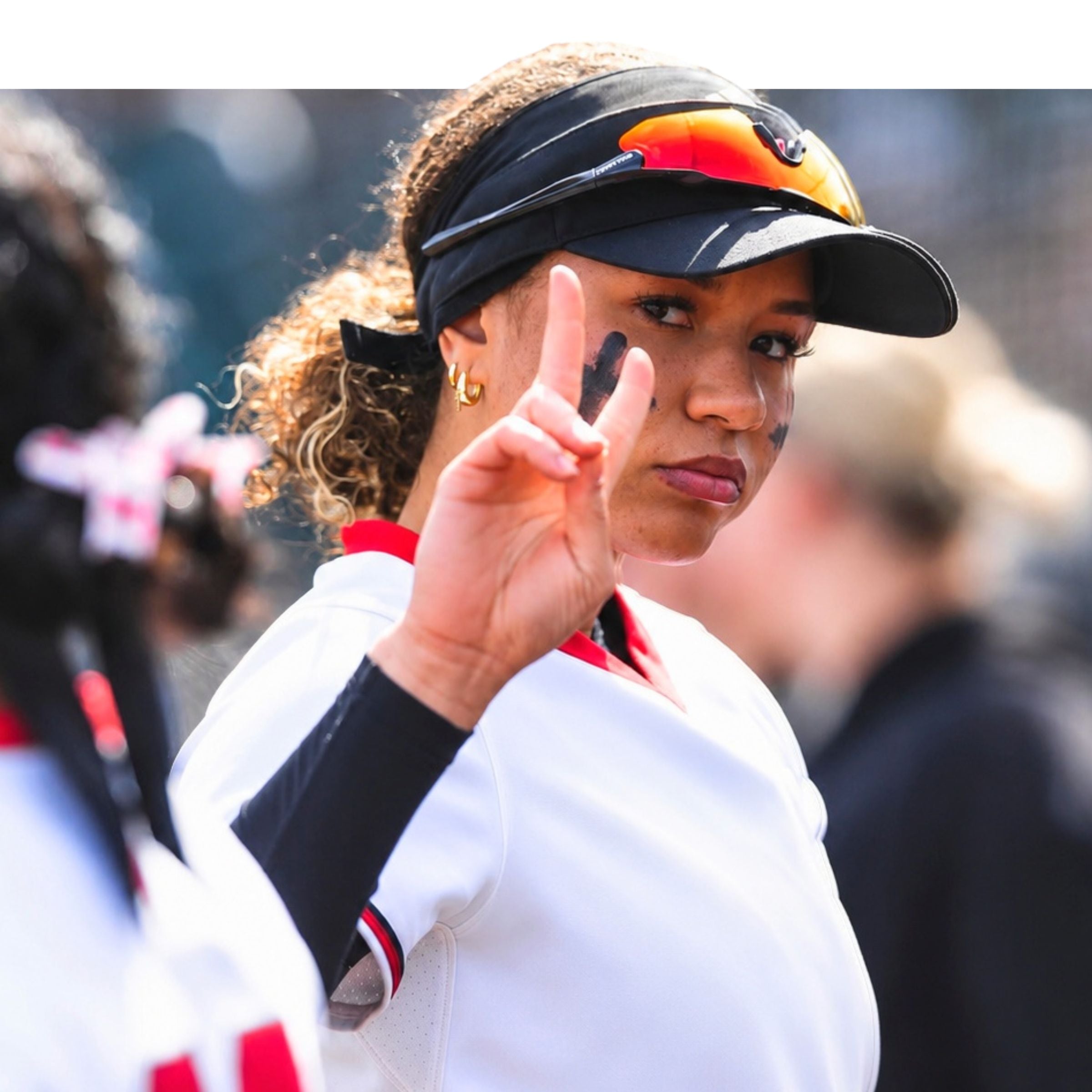 Sammie Bland of Nebraska softball wearing Solaro Shades Nova Softball Sunglasses