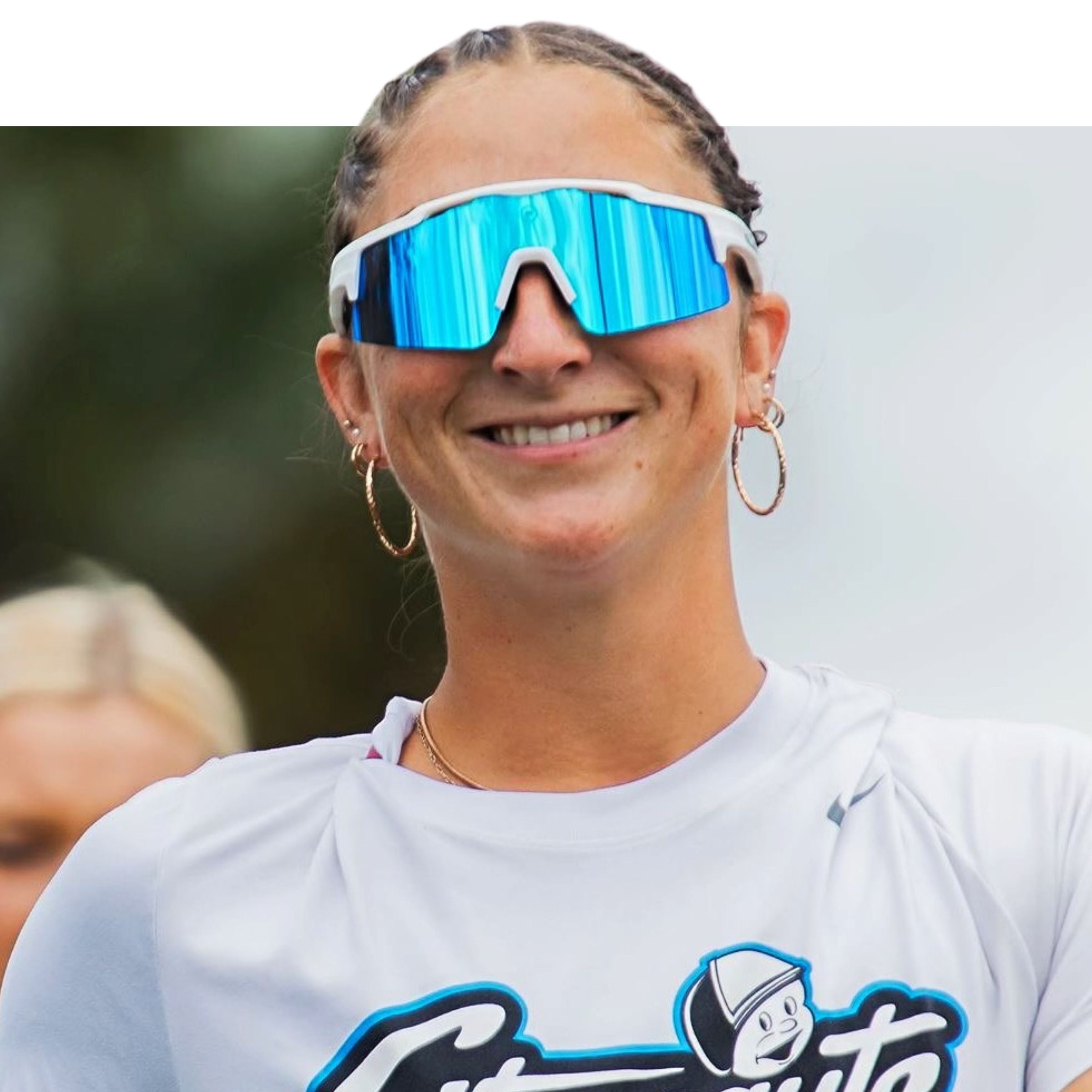 A softball athlete wearing Solaro Shades softball sunglasses, designed by women, for women.