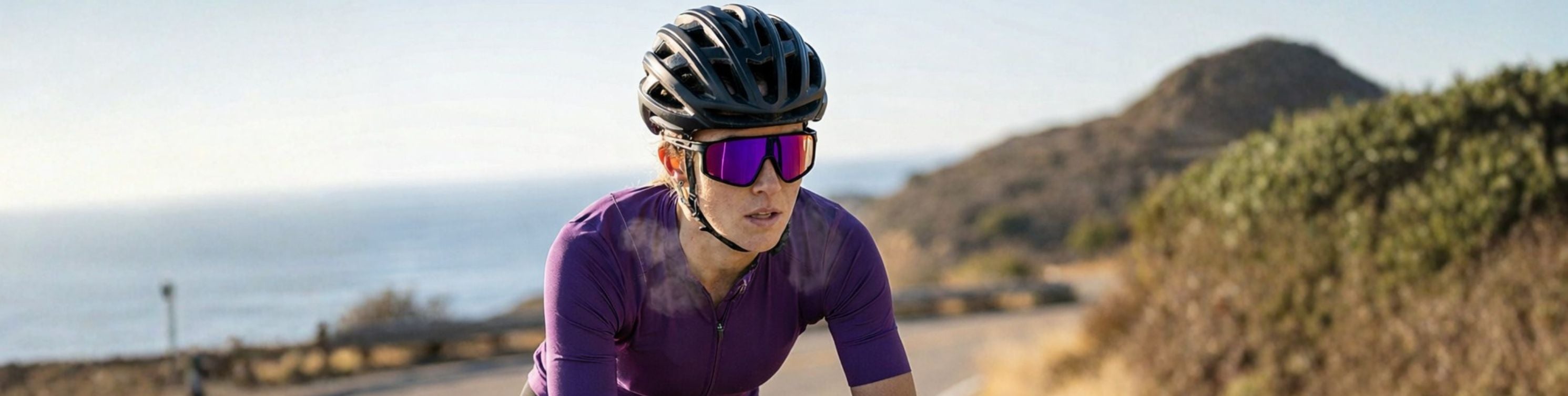 A cyclist wearing Solaro Shades cycling sunglasses
