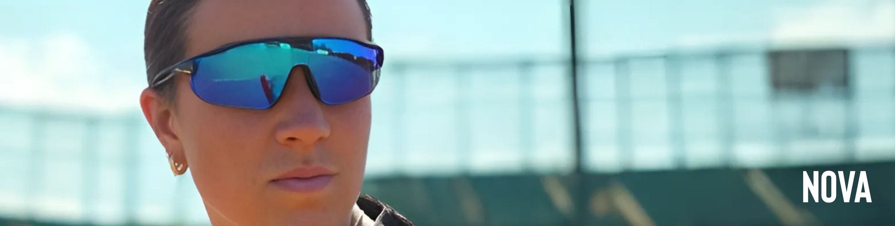 Solaro Shades softball sunglasses in the Nova frame shape. Modeled by September Flanagan of Kansas Softball.