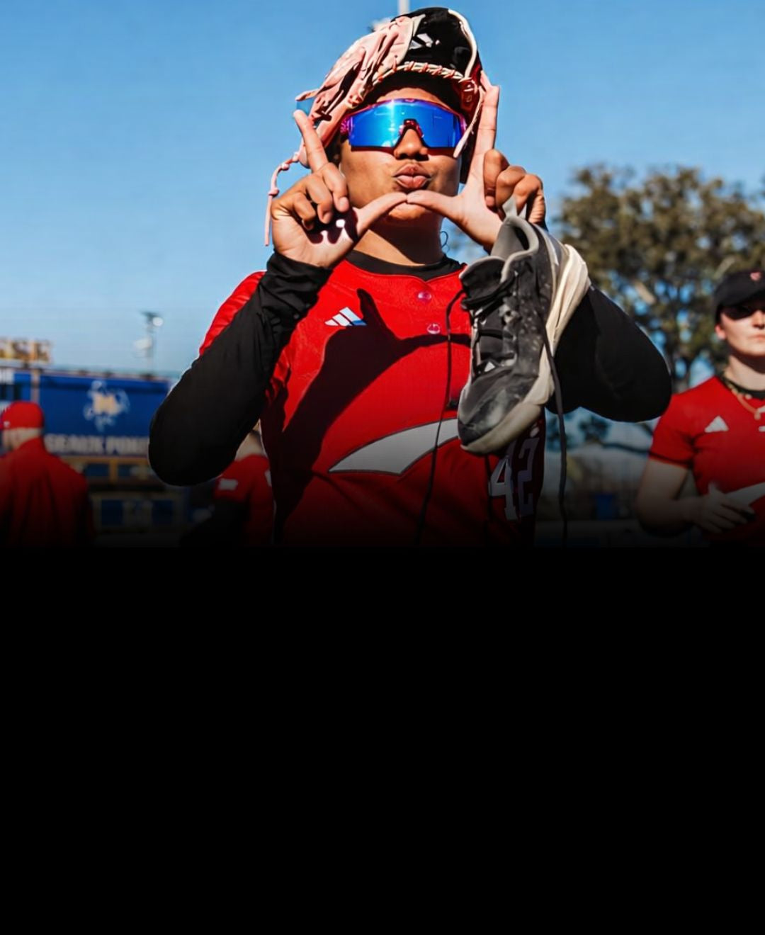 Texas Tech wearing Solaro Shades softball sunglasses for the Red Raiders.