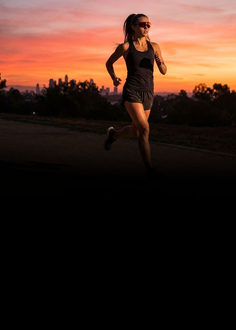 Woman on a run wearing Solaro Shades running sunglasses.