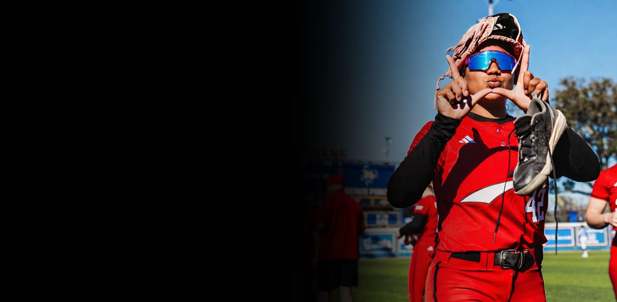 Texas Tech wearing Solaro Shades softball sunglasses for the Red Raiders.