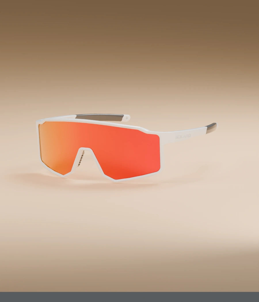 Youth sunglasses facing left in a pastel studio