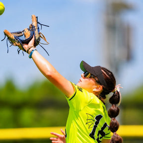 softball player catches ball while wearing black gold Solaro Shades - the leading choice for baseball sunglasses and sports sunglasses and running sunglasses.