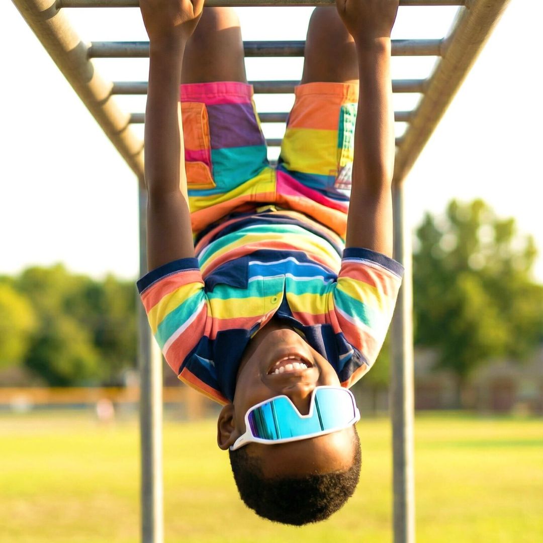 Kid wearing kids sunglasses from Solaro Shades youth sunglasses.
