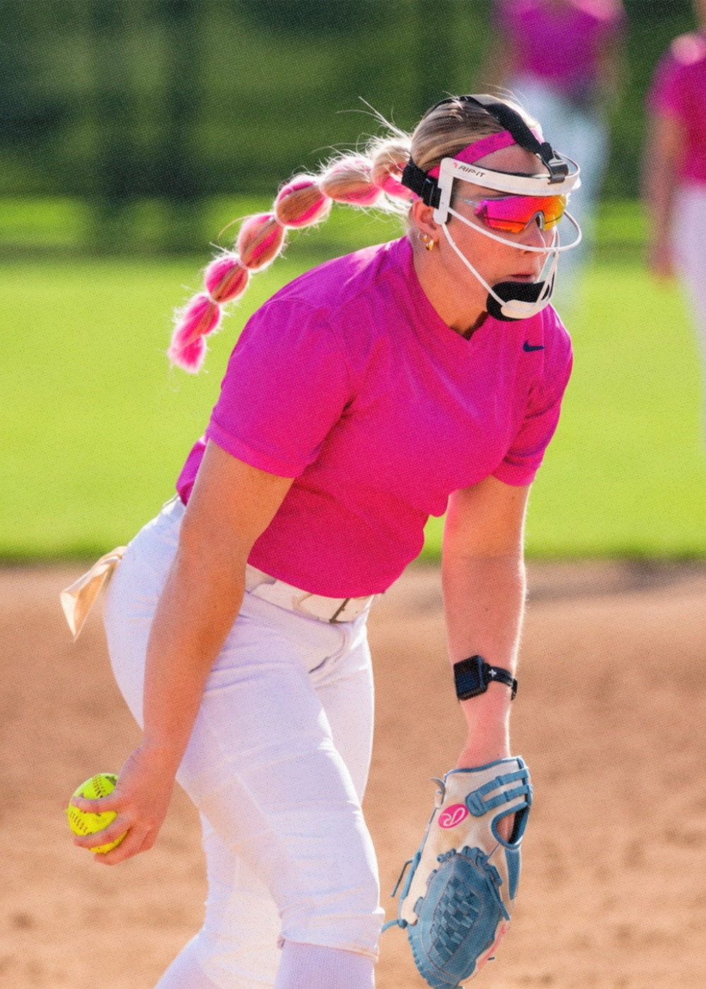 Sophia Schlader is wearing vice nova softball sunglasses by Solaro Shades.