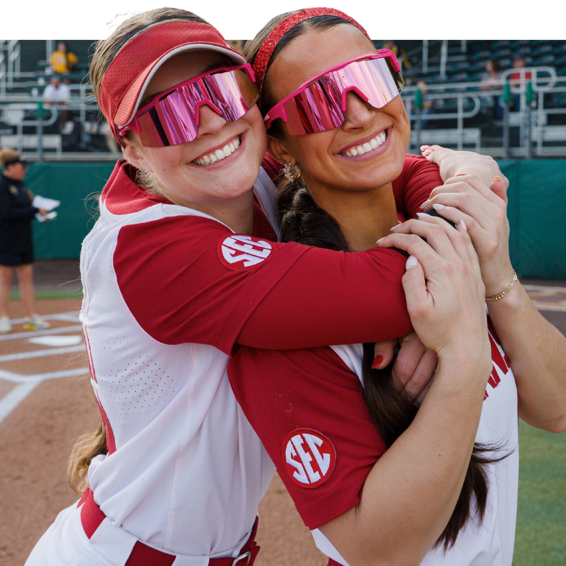 Arkansas Softball athletes wearing Solaro Shades softball sunglasses. 