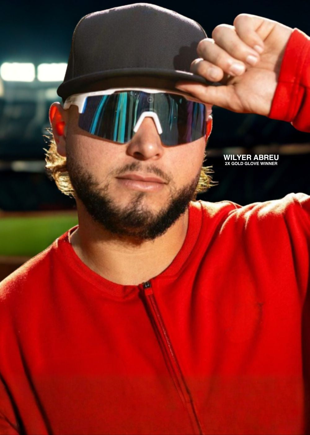 Person wearing baseball sunglasses from Solaro Shades with a baseball red shirt and sunglasses with a baseball cap, standing on a baseball field.
