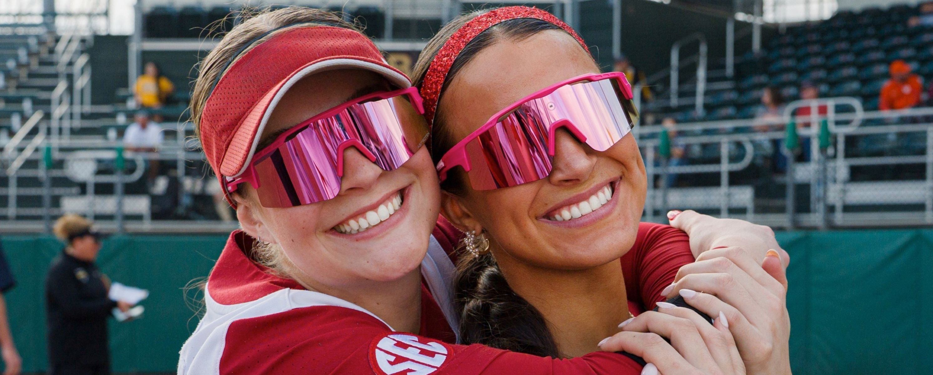 Arkansas Softball athletes wearing Solaro Shades softball sunglasses. 