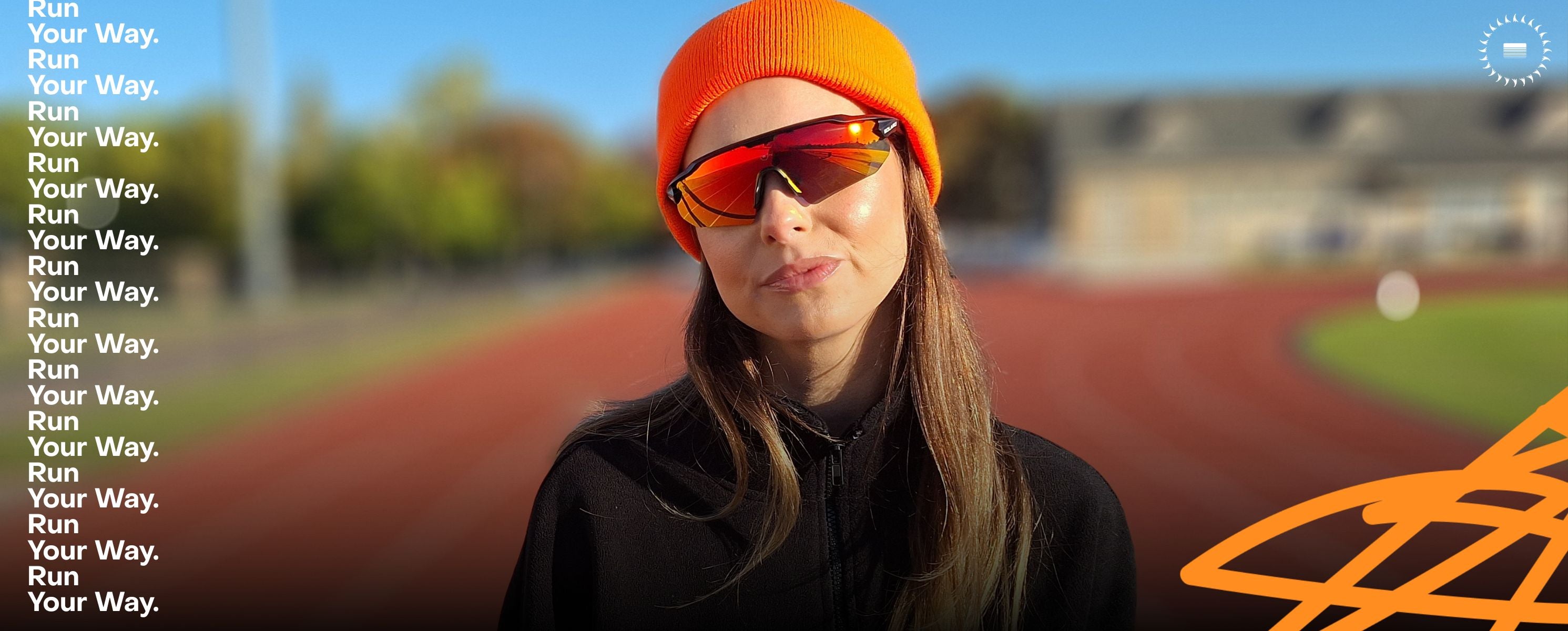 Person wearing Solaro Shades running sunglasses with an orange beanie and sunglasses on a track, with text 'Run Your Way' on the side.