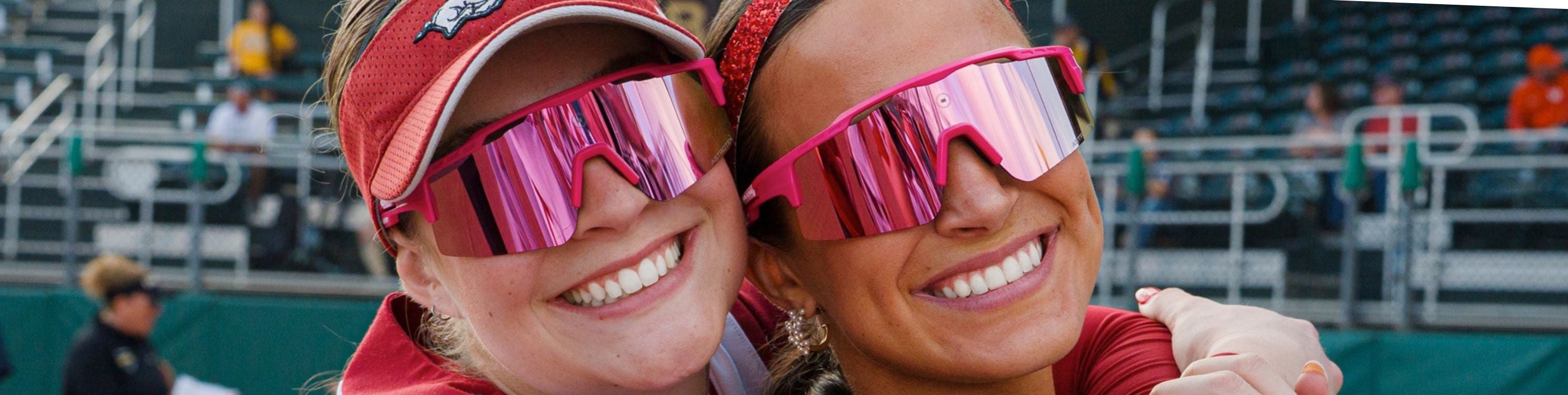 Arkansas Softball athletes wearing Solaro Shades softball sunglasses. 