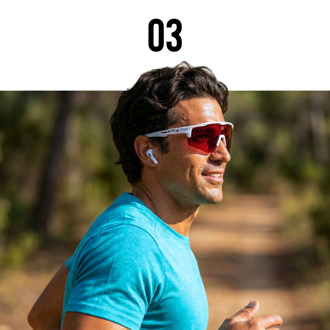 Man wearing red sunglasses and a blue shirt outdoors with solaro shades sports sunglasses for running sunglasses