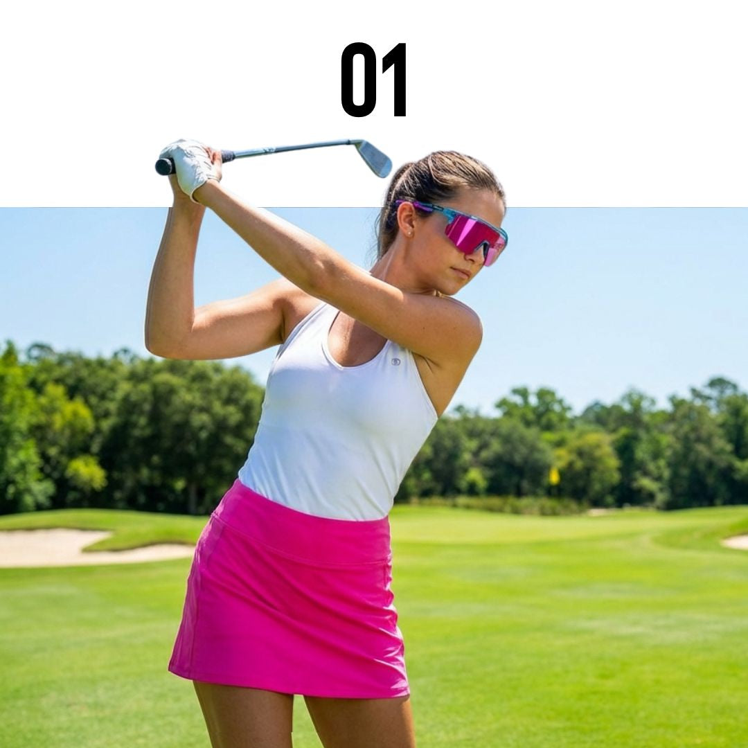 Woman playing golf on a green course with trees in the background wearing solaro shades sports sunglasses as golfing sunglasses. 