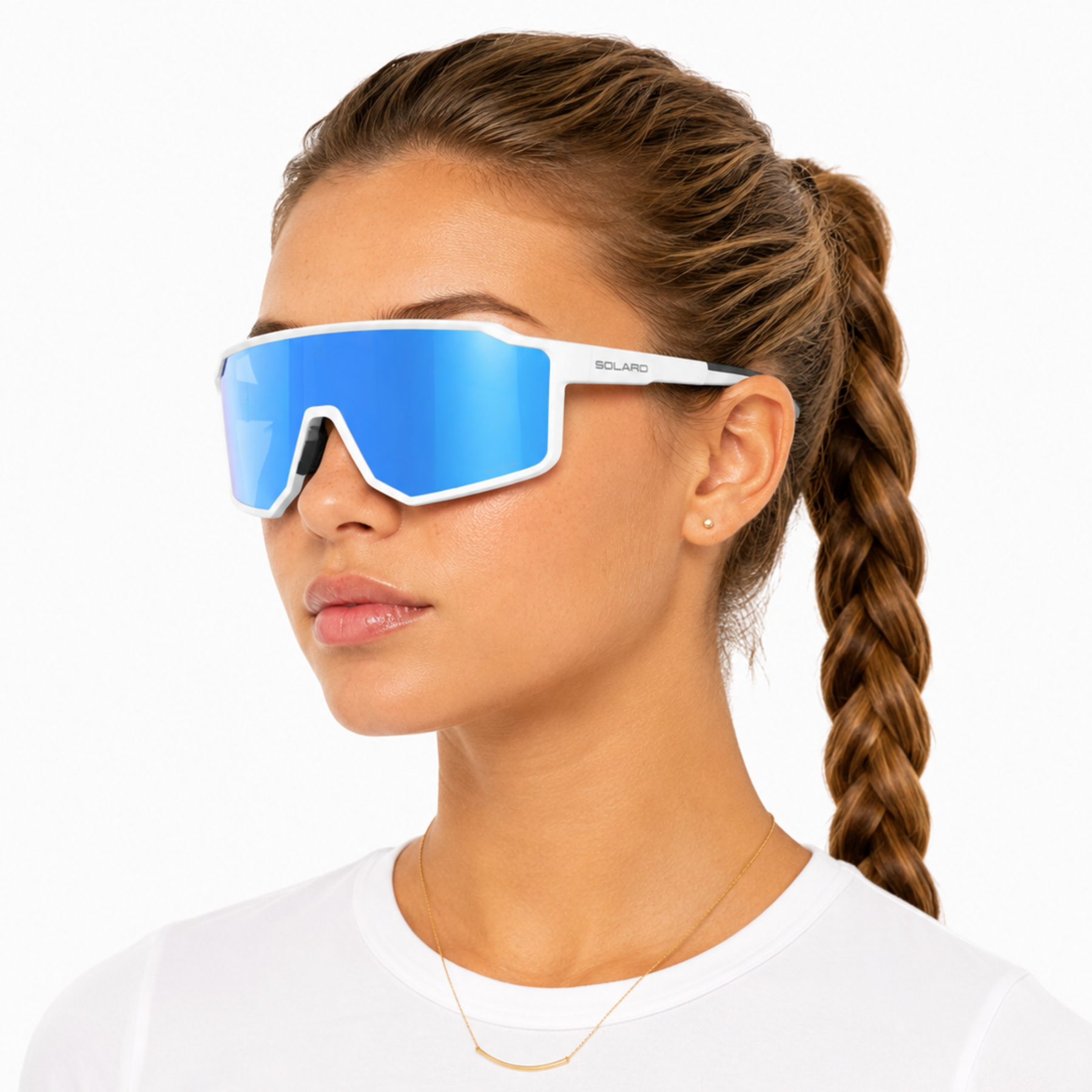Woman wearing blue reflective solaro pluto sunglasses with a white frame on a white background