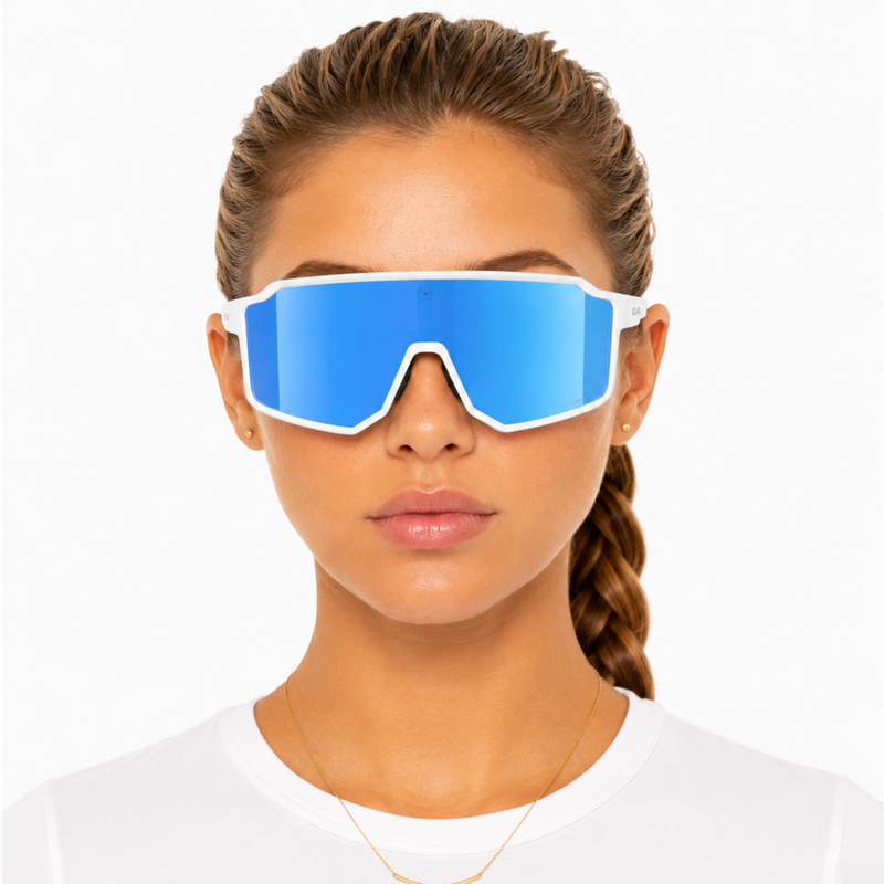 Woman wearing blue reflective solaro pluto sunglasses with a white frame on a white background