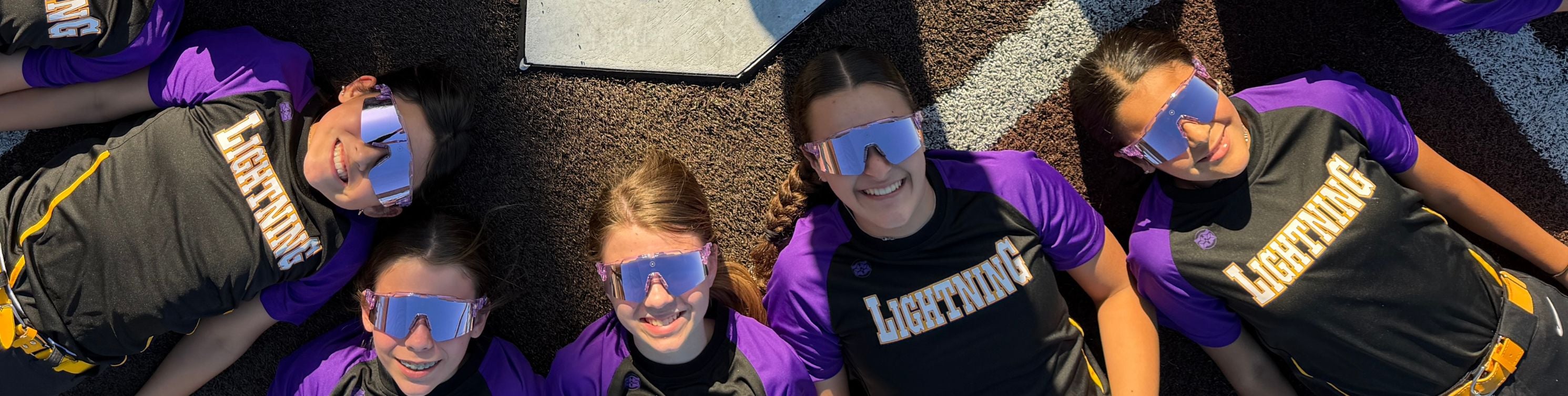 Team wearing matching Solaro sunglasses